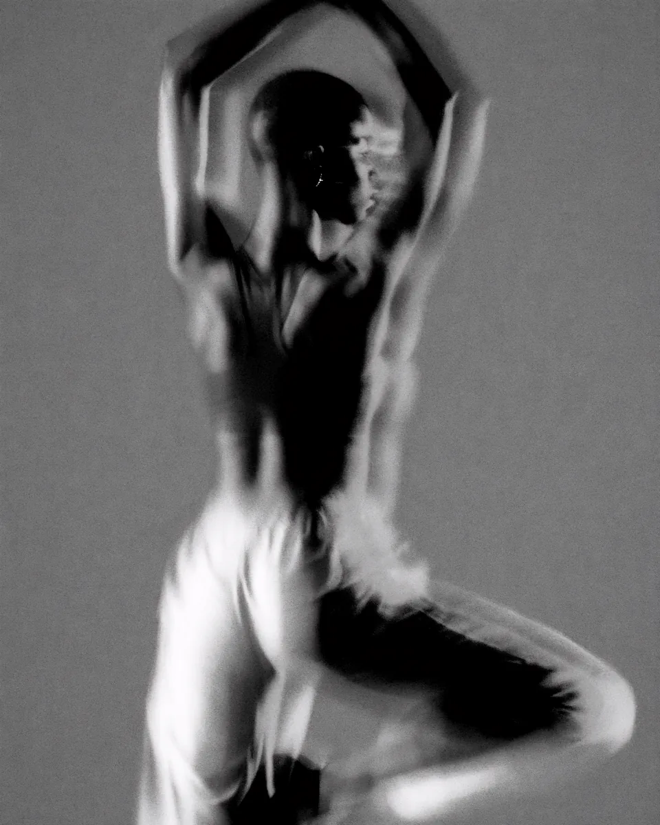 Dancer in motion, black and white long-exposure portrait