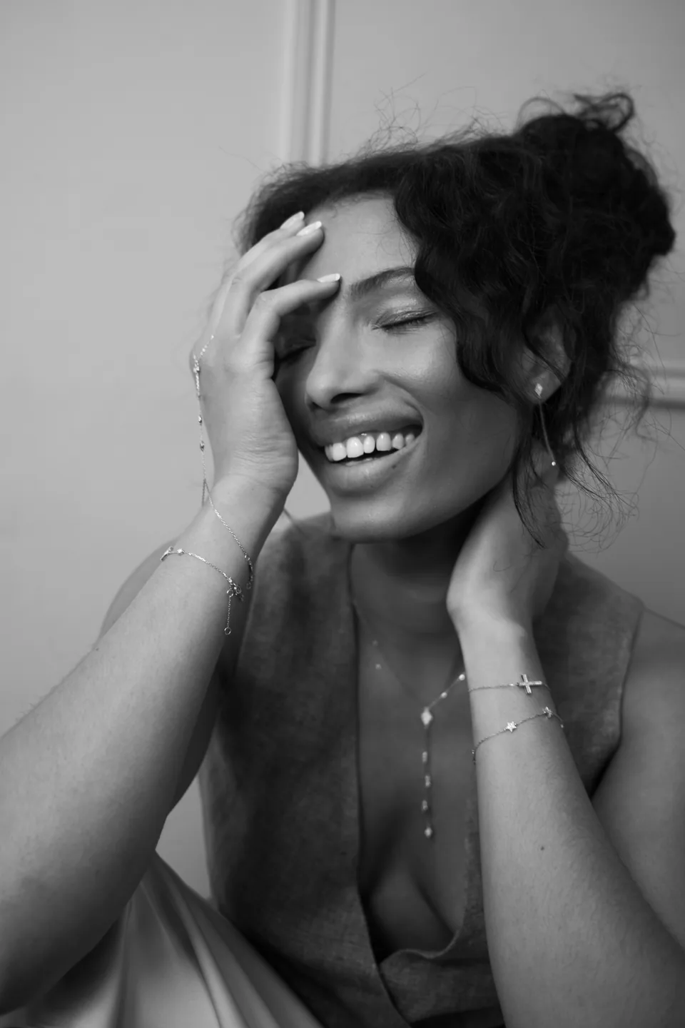 Black and white portrait of a laughing woman, Atamant by Christie content shoot