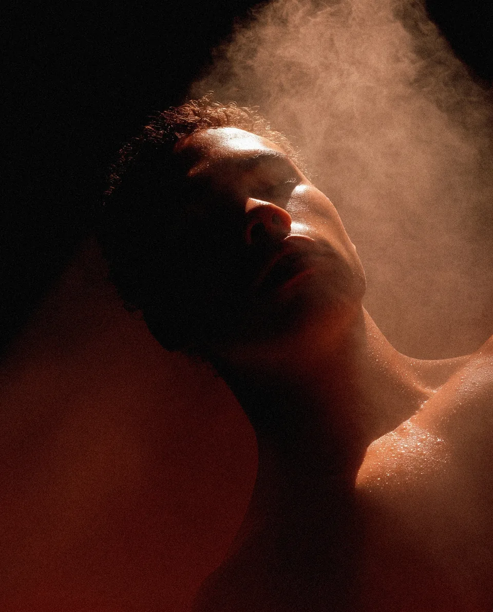 AI-generated athlete with chalk dust in warm light, Chairon House
