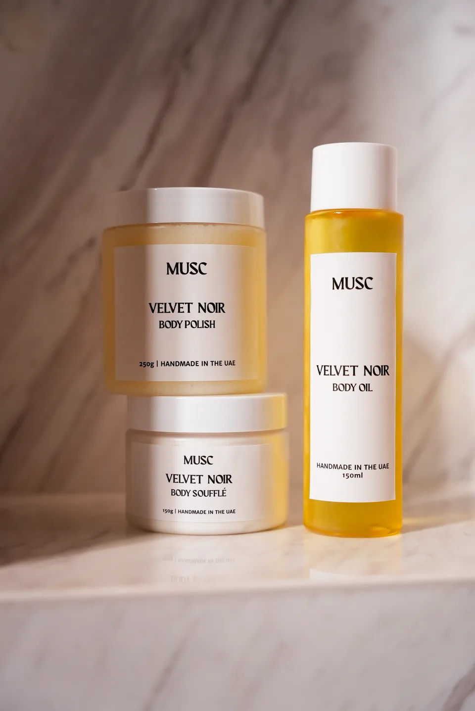 MUSC Velvet Noir body soufflé, polish and oil on marble