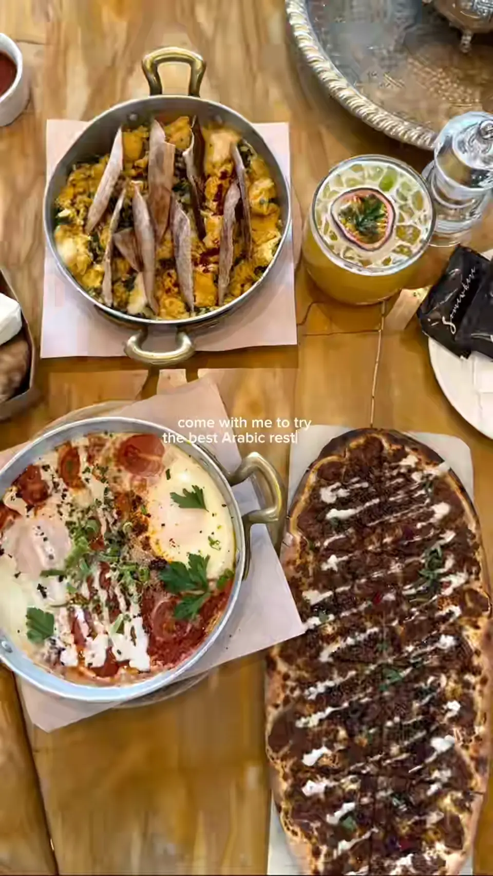 Spread of dishes at Somewhere, from an influencer video